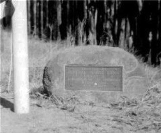 A vintage snapshot of the flagpole base and stone marker at the home of the first Arizona Territory governor.