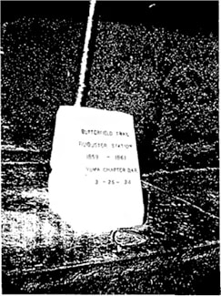 A vintage snapshot of a marker without details; text is unreadable. The Butterfield Overland Mail marker.