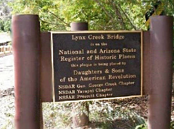 A snapshot of the marker that reads, “Lynx Creek Bridge is on the National and Arizona State Register of Historic Places” with details of the groups that sponsored this marker.