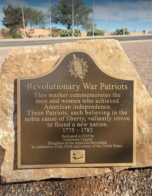 A photo showing the marker on the boulder. 